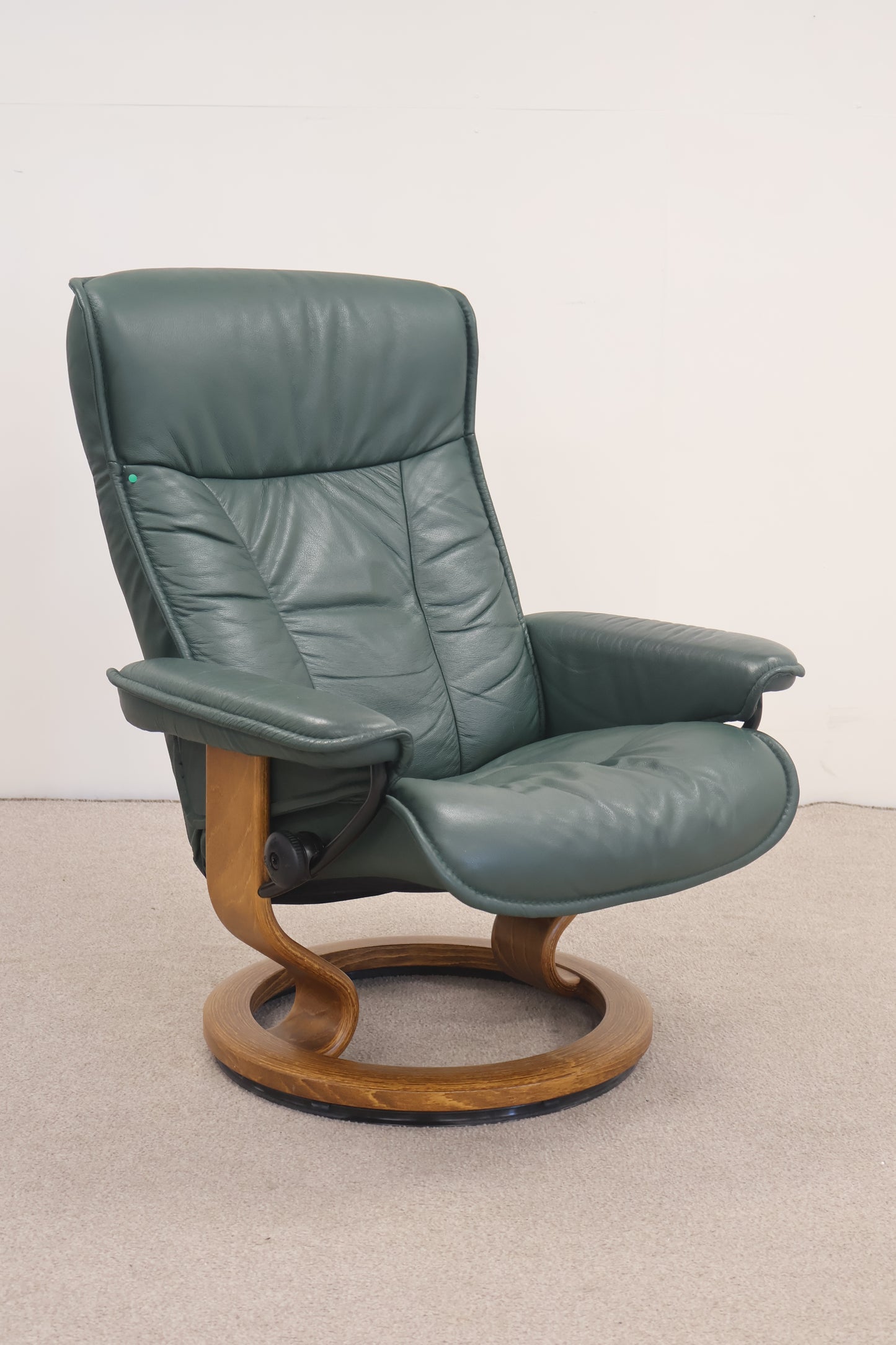 Dark Green Recliner and Footstool by Ekornes