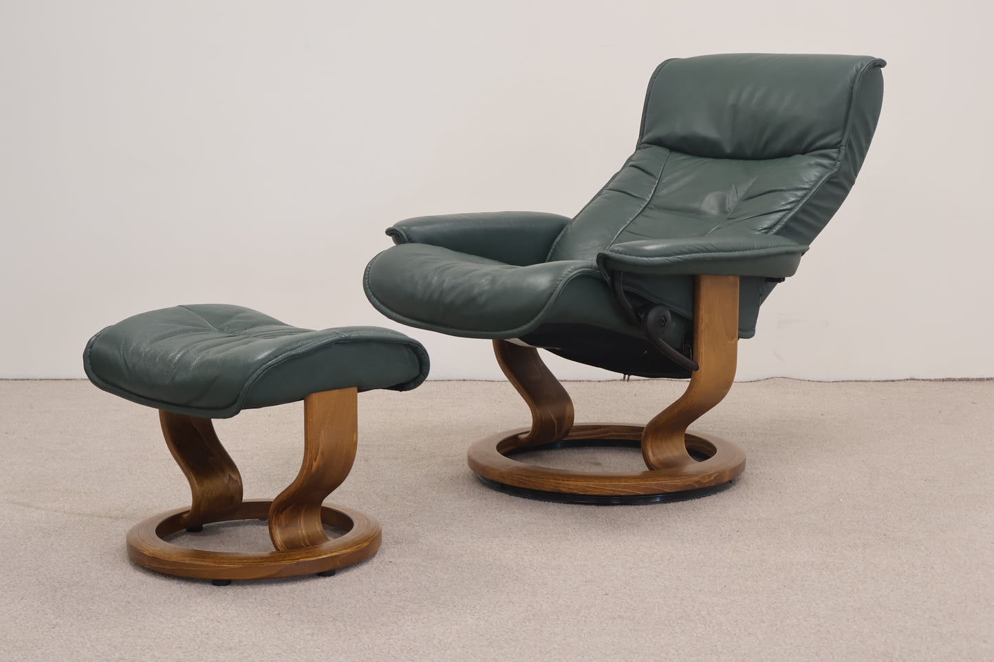 Dark Green Recliner and Footstool by Ekornes