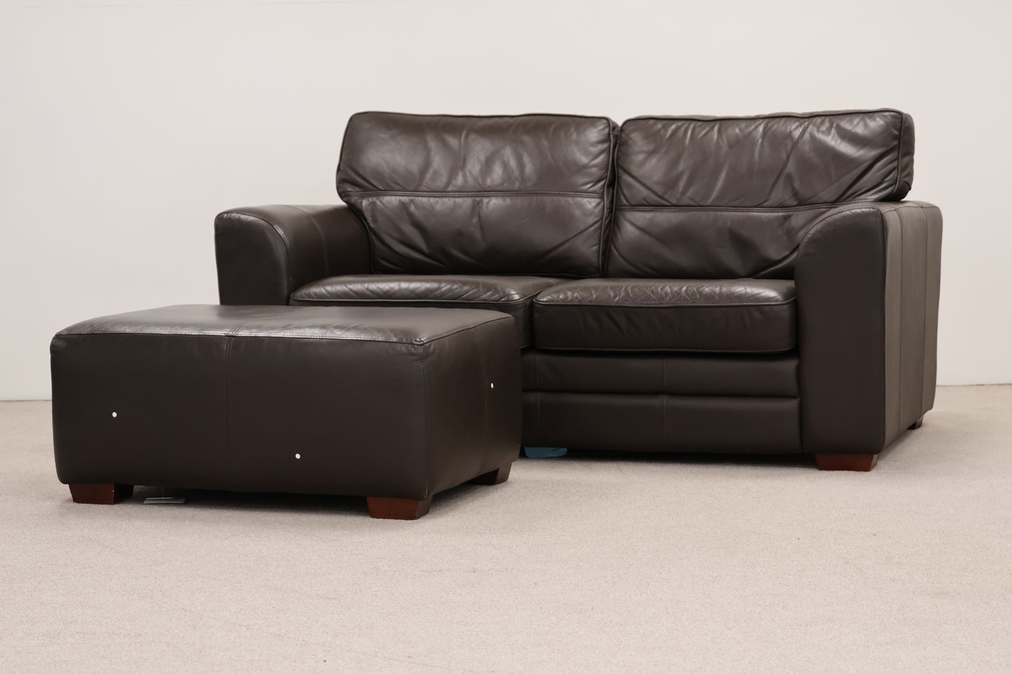 Dark Brown Sofa and Footstool