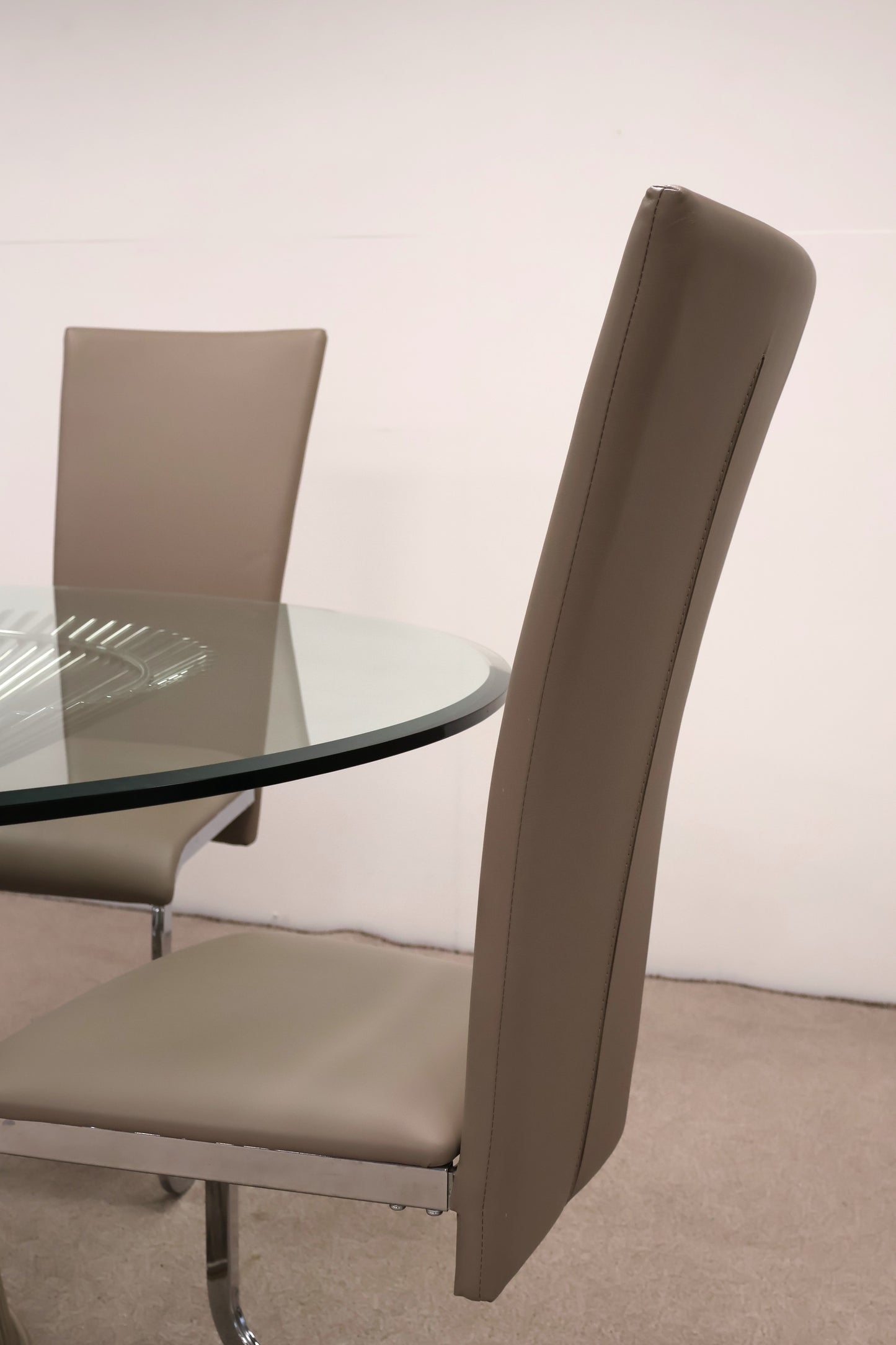 Circular Glass Table with Ornate Chrome base and Chairs