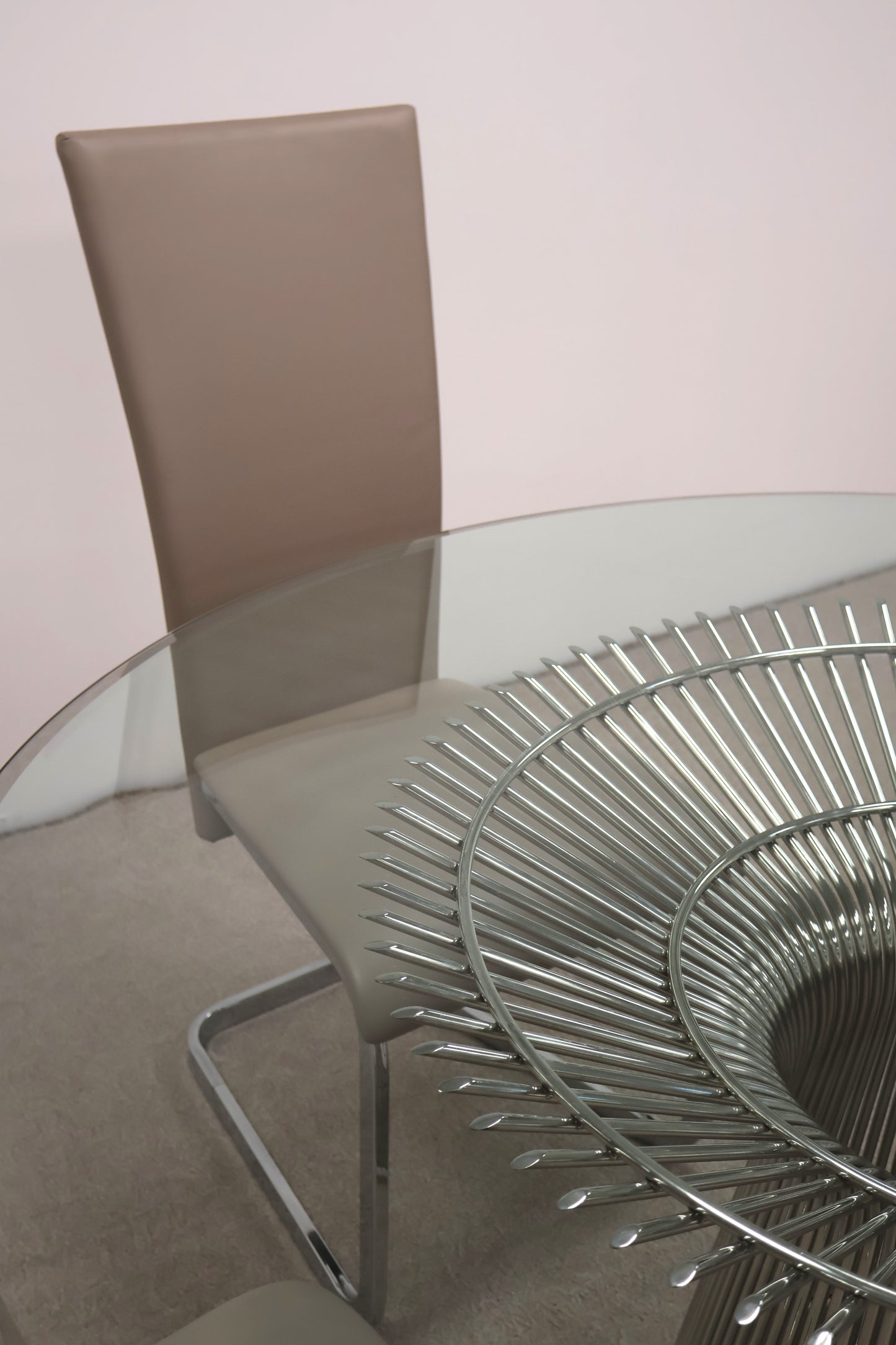 Circular Glass Table with Ornate Chrome base and Chairs