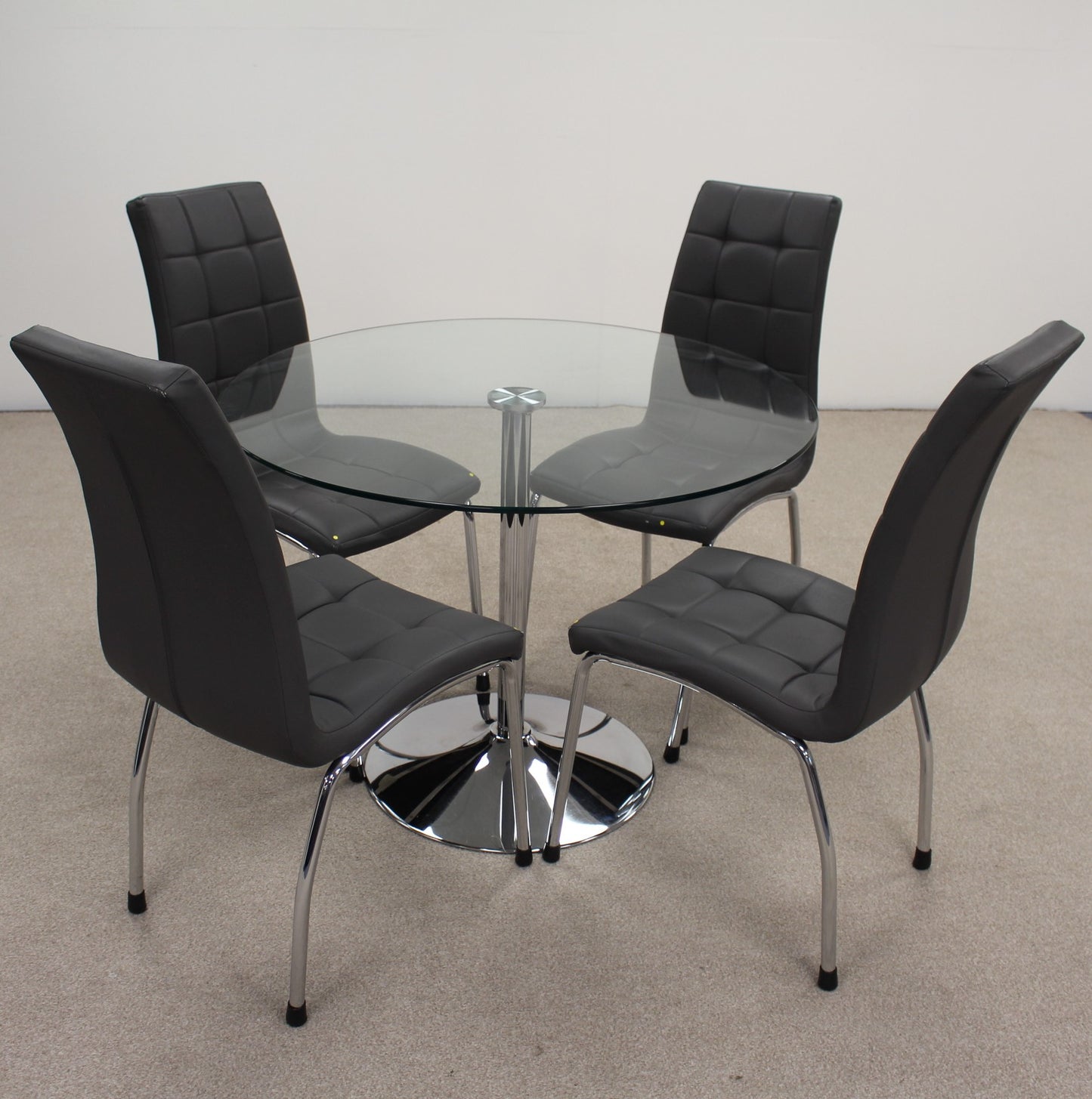 Circular Glass Table with Chairs.