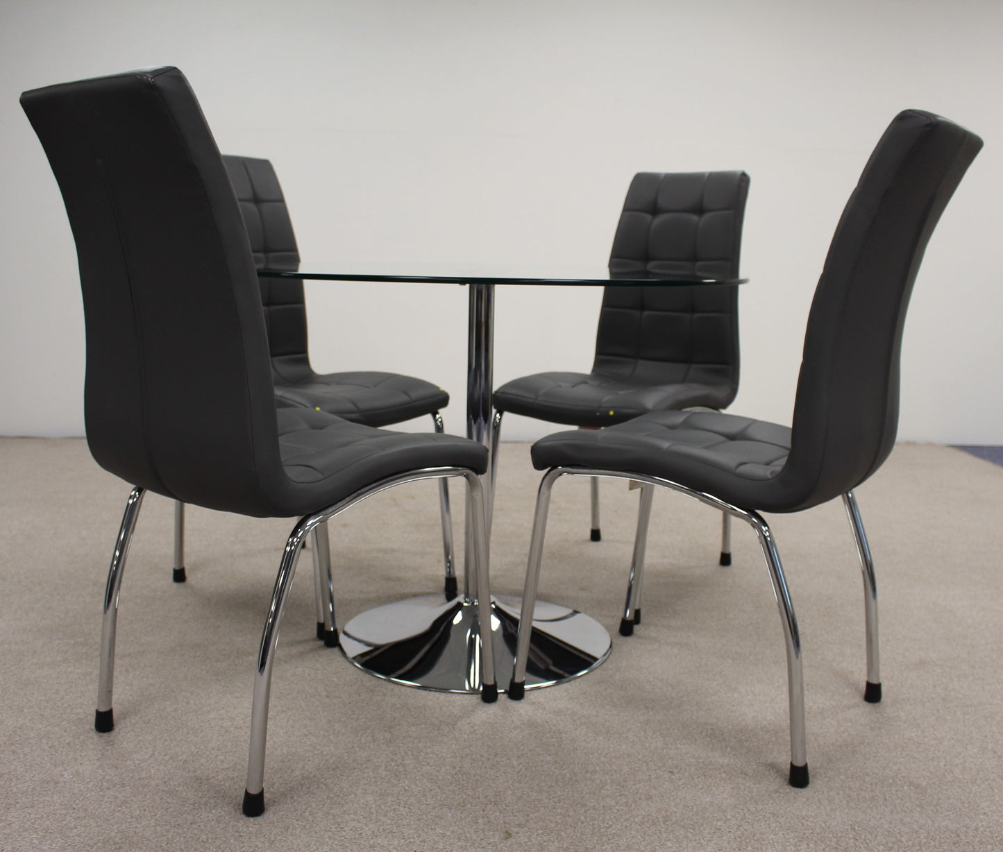 Circular Glass Table with Chairs.