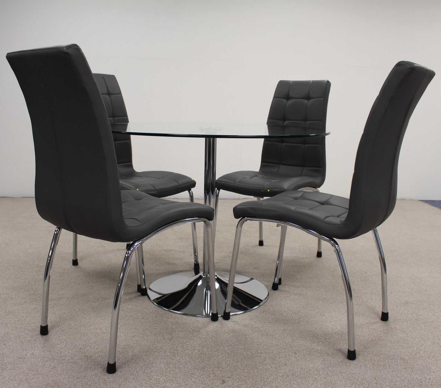 Circular Glass Table with Chairs.