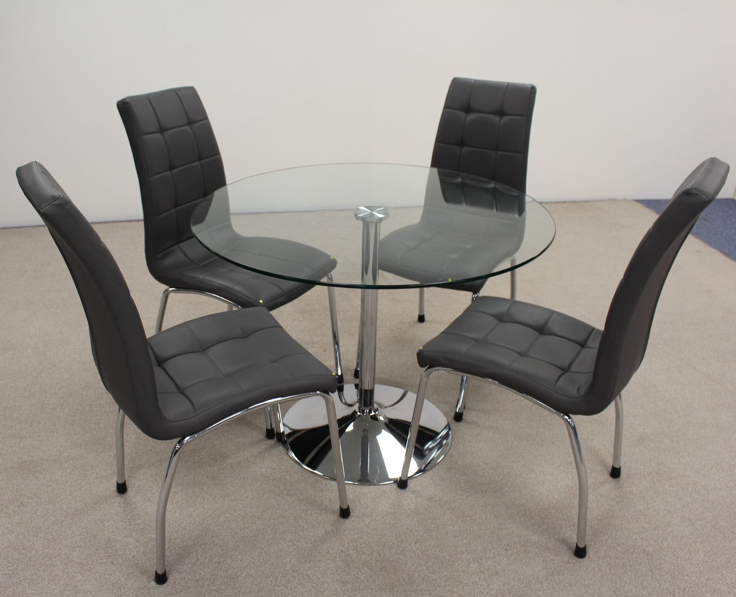 Circular Glass Table with Chairs.