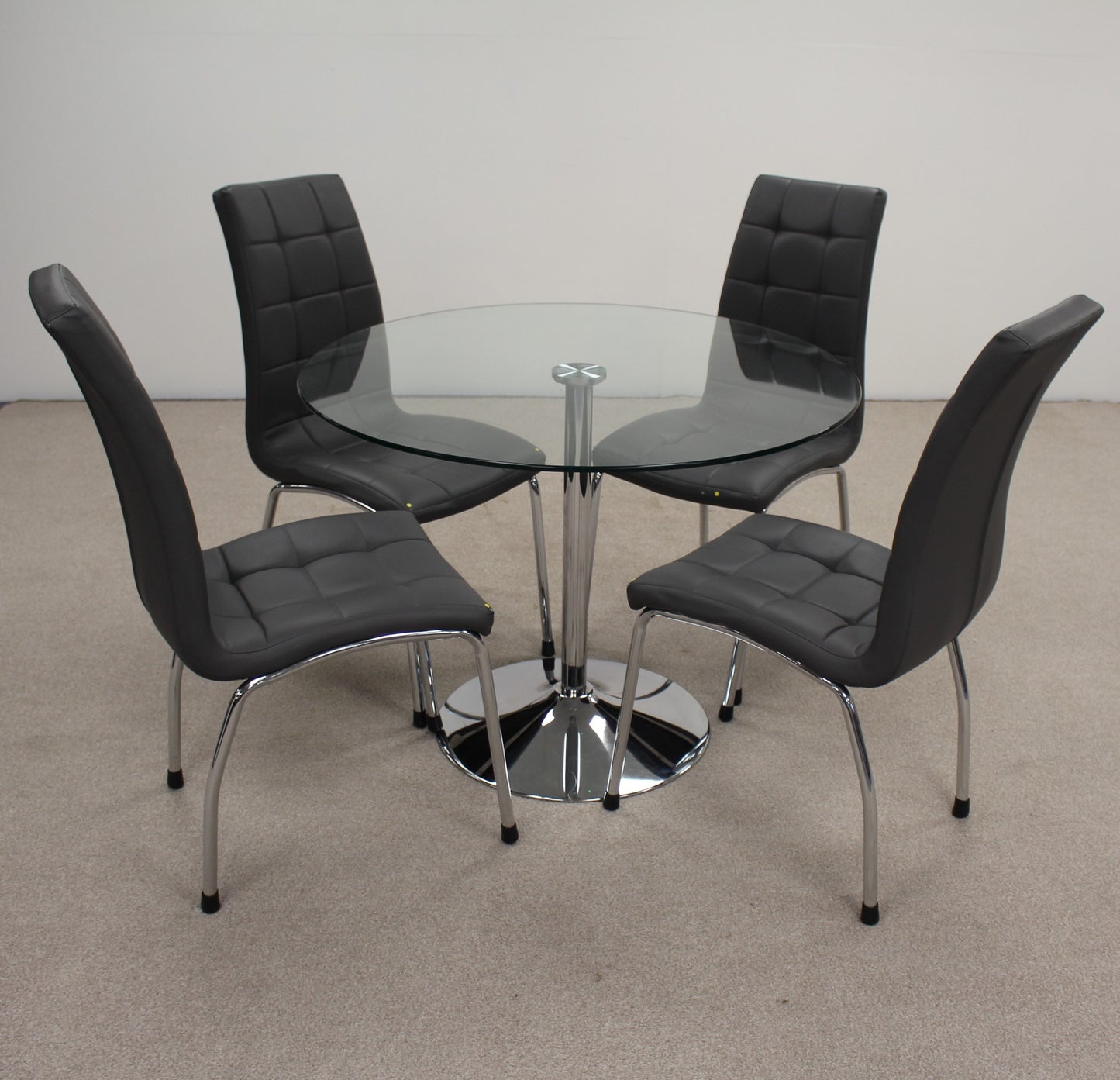 Circular Glass Table with Chairs.